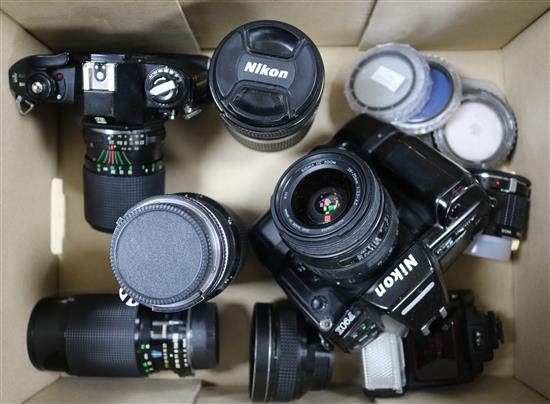 A Nikon F90X and Nikon EM, Lenses etc